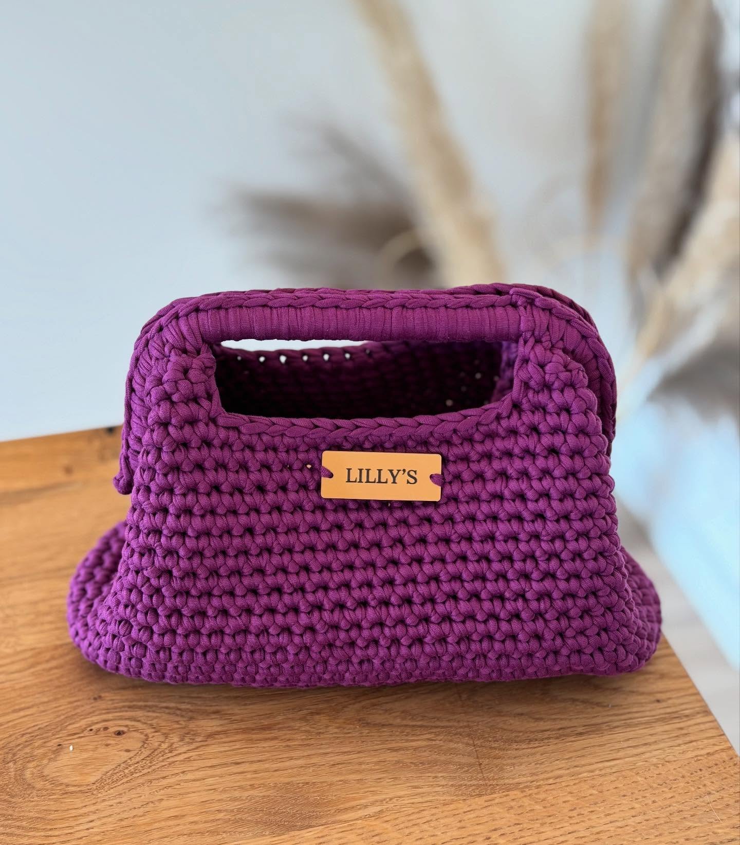 Ljubičasta heklana torbica